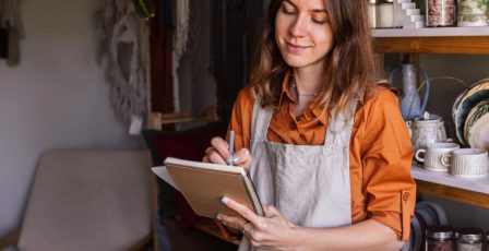 Smaller business owner checking stock