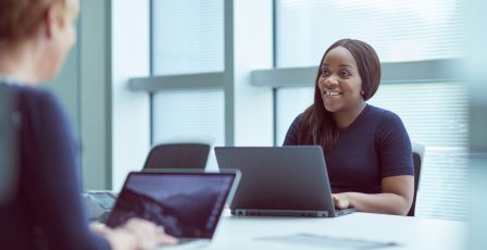 Two colleagues in the office having a conversation