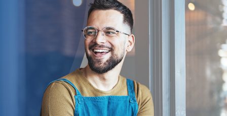 Small business owner smiling