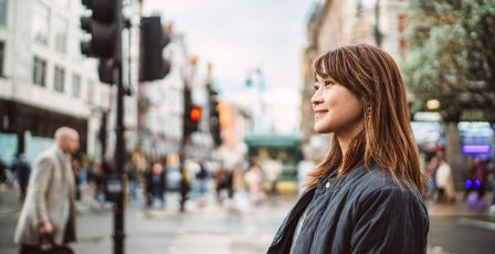 Woman walking down a street