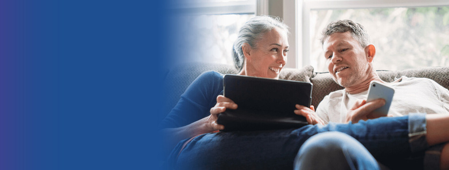 A couple using devices